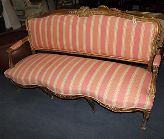 A French giltwood settee, W.173cm